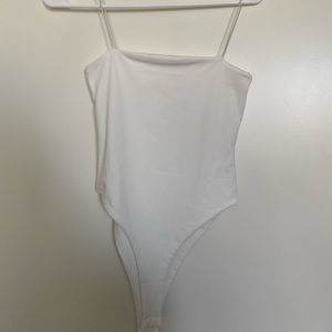 Brand new white bodysuit